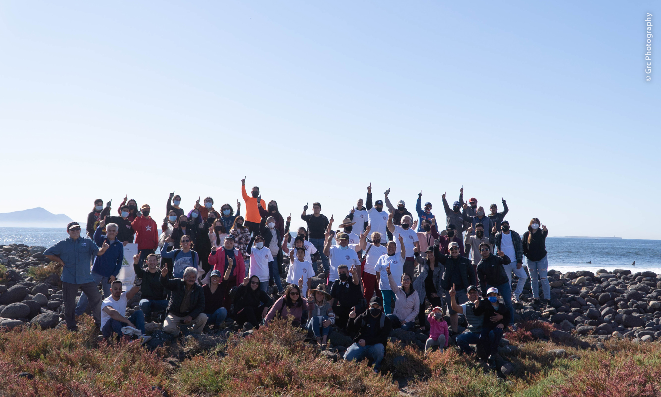 Group of volunteers ready to collect waste at Arroyo San Miguel State Park.